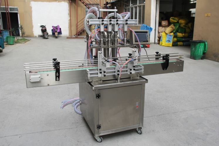 Nieuw ontwerp semi-automatische olie / sap / water / honing Vloeibare glas blik Plastic fles vulmachine