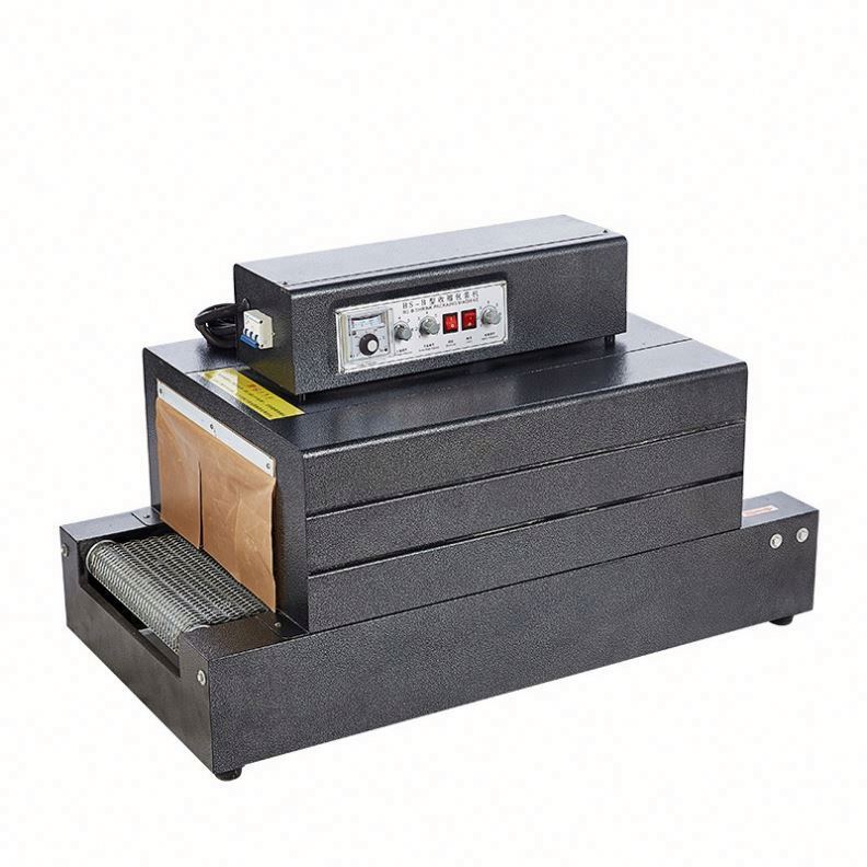 Warm verkoop Kleine plastic film warmtetunnel krimpen snijmachine verpakkingsmachine voor fles / doos Gemakkelijk te bedienen