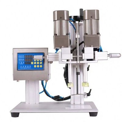 Tafelmachine voor het halfautomatisch afdekken van flessen, pneumatisch aangedreven