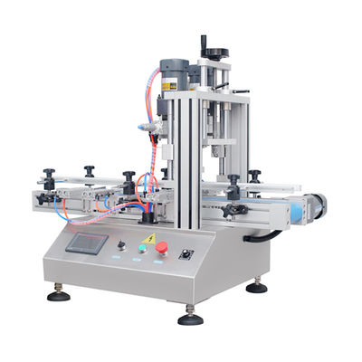 Pneumatische tafelmachine voor het automatisch afdekken van flessen