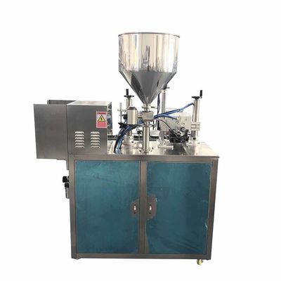 Automatische machine voor het vullen en afdichten van cosmetische crèmebuizen met ultrasone zachte buizen